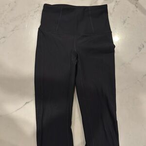 Black lululemon leggings, size 2. Excellent condition. Like new.